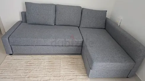 Grey L-shaped Sofa Bed with Storage - Good Condition