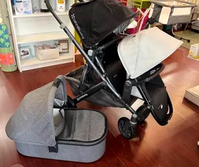 Uppababy Double Stroller with bassinet and accessories