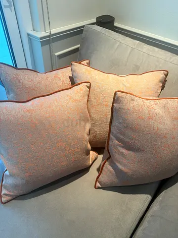 4 x Dark Orange/grey Decorative Cushion (without filler). AED 100 per item. 50x50cm