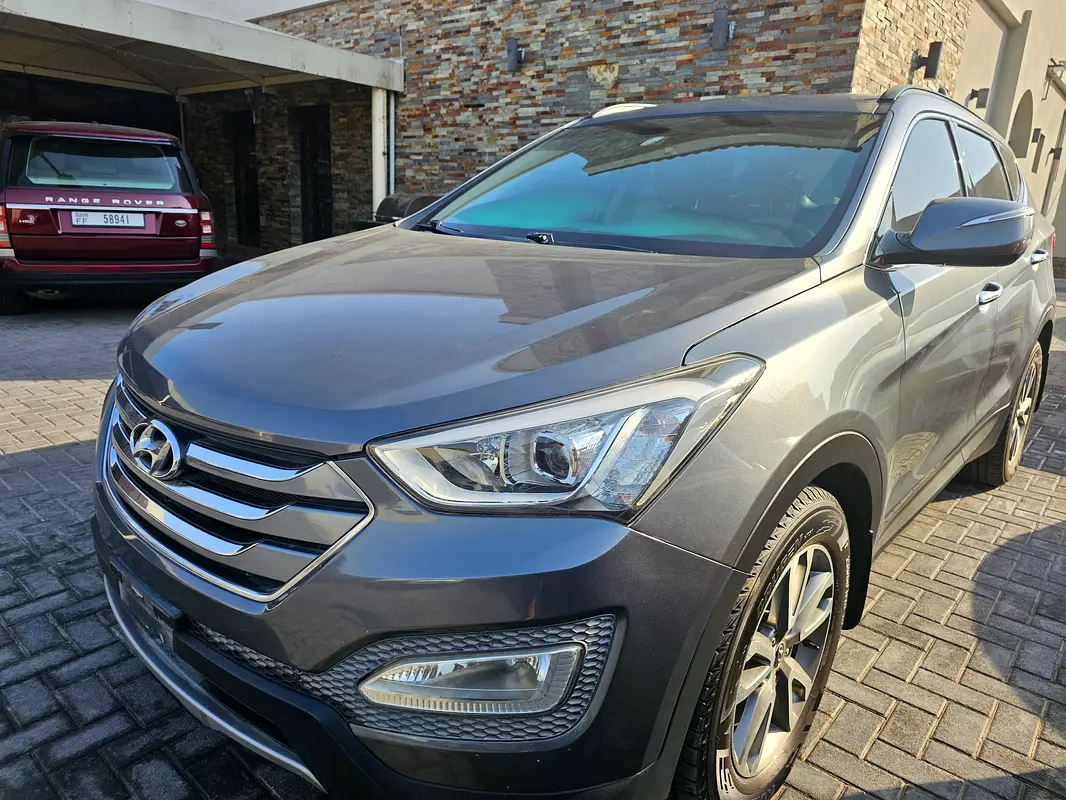 Hyundai Santa Fe 2014 — photo 1 of 4