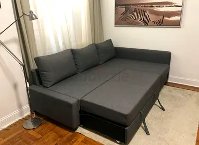 Grey L-shaped Sofa Bed with Storage - Good Condition