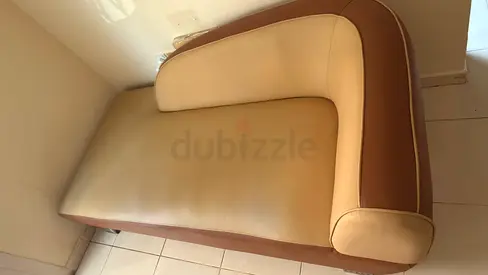 Single-seater brown  beige leatherette lounge chair (good condition)