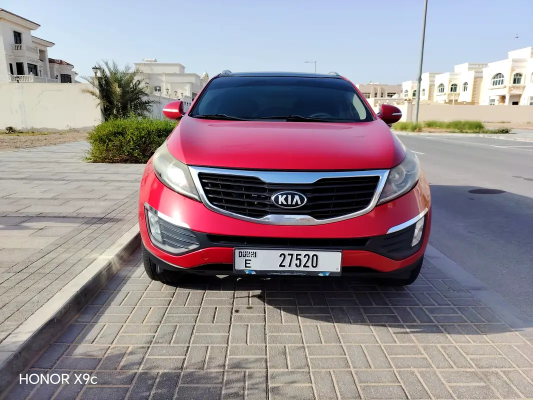 Kia Sportage 2014 — photo 1 of 8
