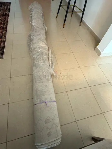 Light beige/cream large area rug - rolled, unused