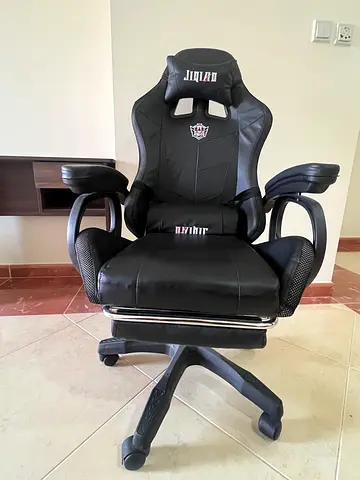 Black PU Leather Gaming/Office Chair with Armrests and Headrest