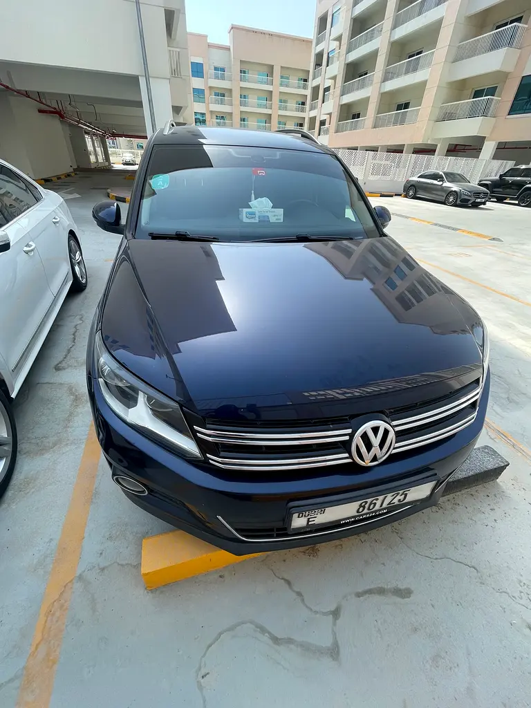 Volkswagen Tiguan 2014 — photo 1 of 4