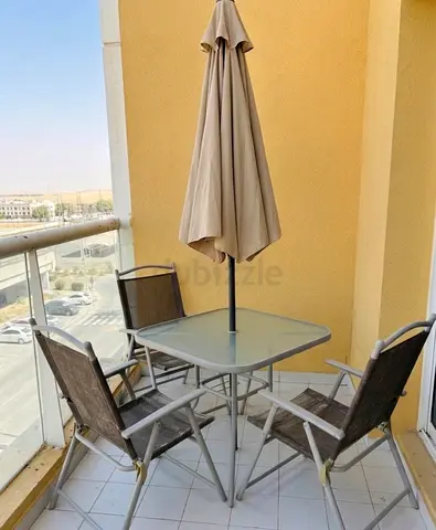Outdoor balcony dining set – table with 4 chairs and umbrella only 3 chairs