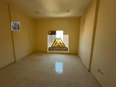 Studio in Al Rashidiya 2, large space, semi-separate kitchen, central AC. AED 18K yearly, 4 payments