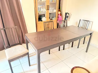 Dining table with 4 chairs and bench - good condition