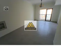 Brand-new 2-bedroom apartment in Al Hamidiya 1 with 3 bathrooms and a balcony. Free parking, gym, an