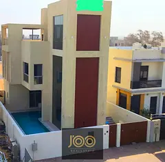 For rent in Al Zahia, Ajman, a villa consisting of 4 master bedrooms, a majlis, a living room with a