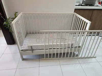 White Baby Crib with Guard Rail