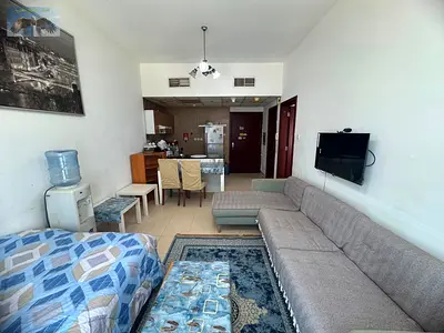Furnished apartment for rent in City Tower one bedroom living room balcony two bathrooms private parking prime location opposite Grand Mall