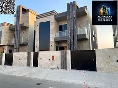 A luxurious modern villa for sale in Al Yasmeen, Ajman, featuring exceptionally high-quality, custom