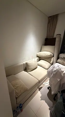 Light beige L-shaped fabric sofa - good condition