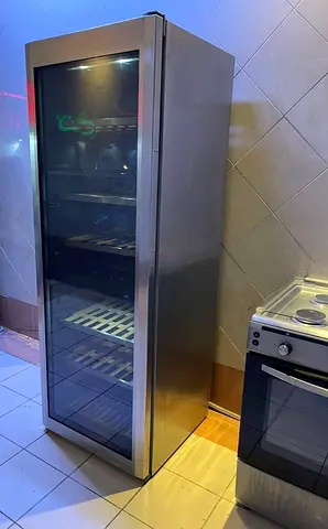 LIEBHERR LATEST MODEL 150 bottle wine cooler dual temperature wooden shelves freestanding
