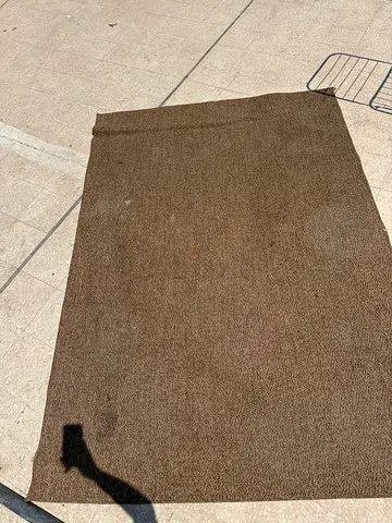 Brown textured solid color rug