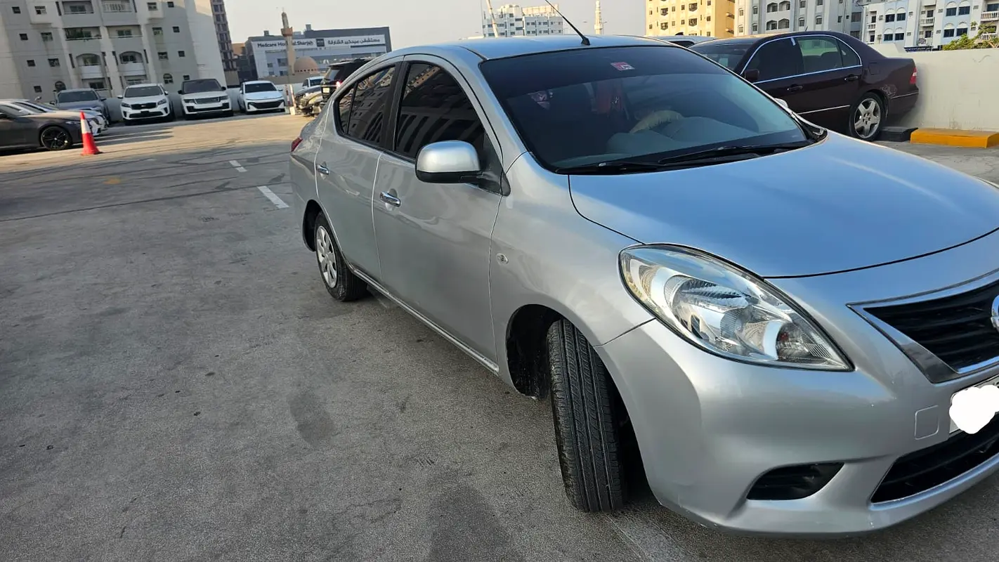 Nissan Sunny 2014 — photo 1 of 5