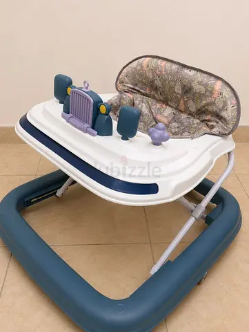 Baby walker with toy tray and padded seat - good condition