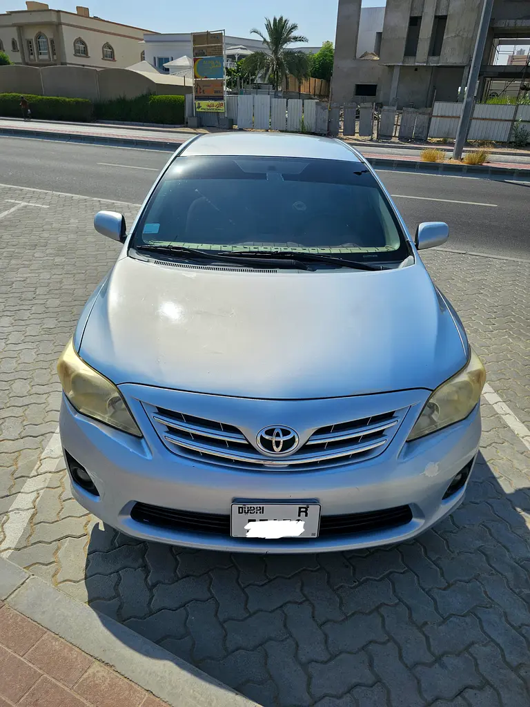 Toyota Corolla 2012 — photo 1 of 14