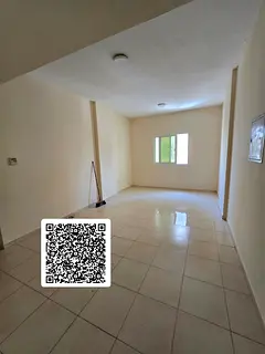 Annual Apartment for Rent in Al Nuaimiya 2, Ajman A spacious one-bedroom apartment with a large livi