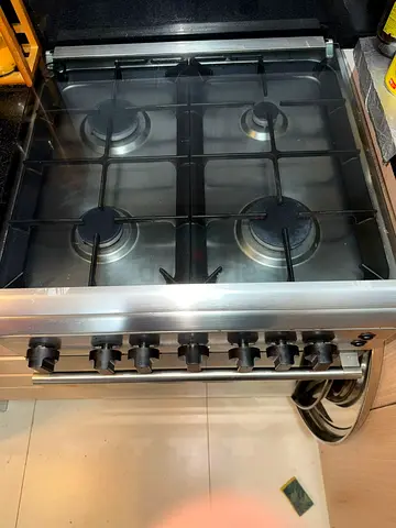 Used 4-Burner Stainless Steel Gas Cooker with Oven - Good Working Condition