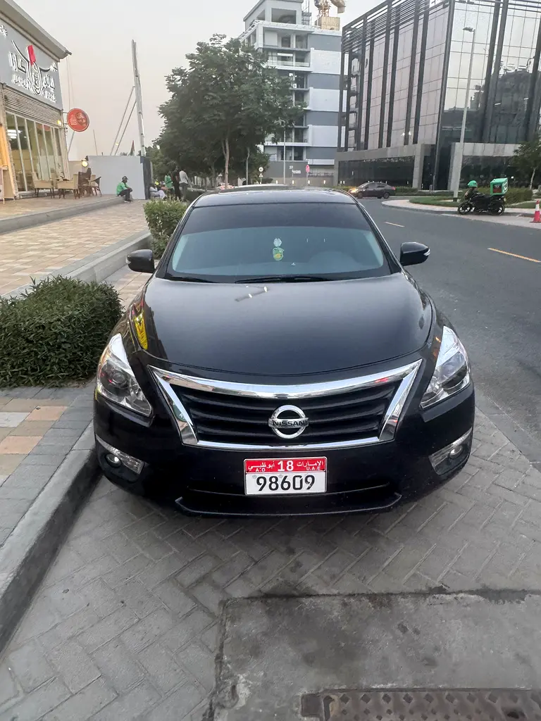 Nissan Altima 2015 — photo 1 of 6