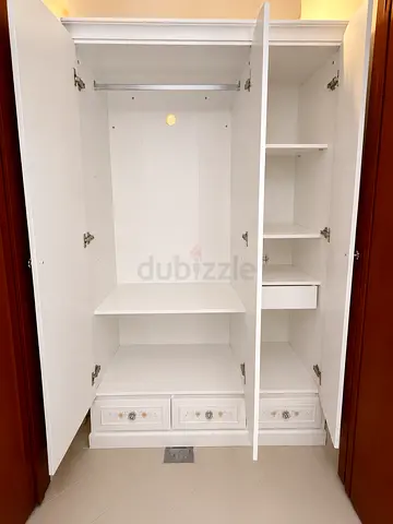 White 3-Door Wardrobe with Shelves and Drawers - Good Condition