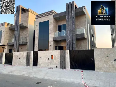 A luxurious modern villa for sale in Al Yasmeen, Ajman, featuring exceptionally high-quality, custom finishes that reflect the utmost in luxury. Freeh
