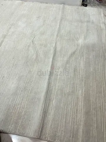 Large beige/cream modern area rug - gently used