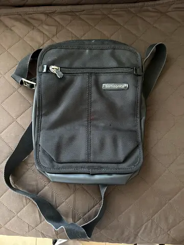 Small black Samsonite crossbody shoulder bag - compact travel pouch