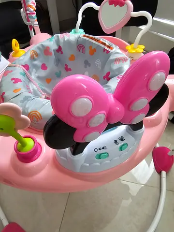 Pink baby jumper  walker activity seat with toy tray — gently used