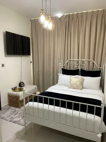 EXECUTIVE MASTER BEDROOM WITH A PRIVATE STUDY: TO LET DAMAC HILLS 2