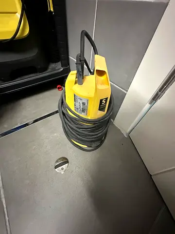 Used small submersible water pump with long power cable