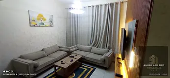 The best furnished two-bedroom apartment with a living room is available for annual rent in Al-Hamid
