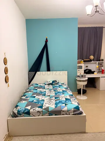 Room for Rent for Couples Near Zahia City Centre, Muwaileh – Spacious  Convenient Location