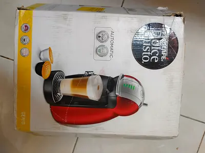 Nescafe Dolce Gusto Genio automatic capsule coffee machine, brand new