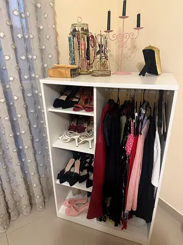 White open wardrobe shelf unit with hanging rail and cubbies - used