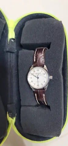 Classic brown leather ladies wristwatch with date window