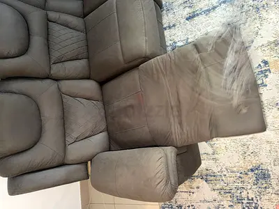 Gray 3-Seater Recliner Sofa in Good Condition. One recliner pull handle is broken