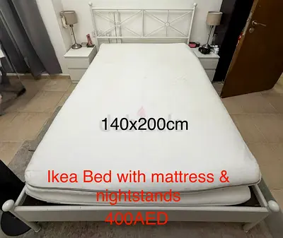 IKEA white metal double bed frame with mattress and nightstands