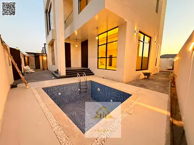 Villa for sale with a swimming pool, price includes electricity, water, and air conditioning (negotiable). Two floors and a rooftop terrace. Located n
