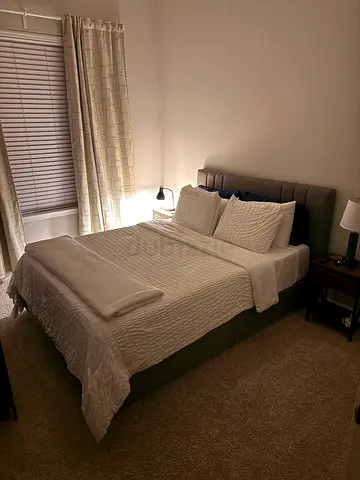 Queen upholstered bed frame with mattress and bedding included