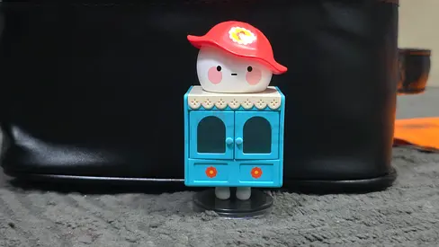Little Character on Blue Cabinet Toy