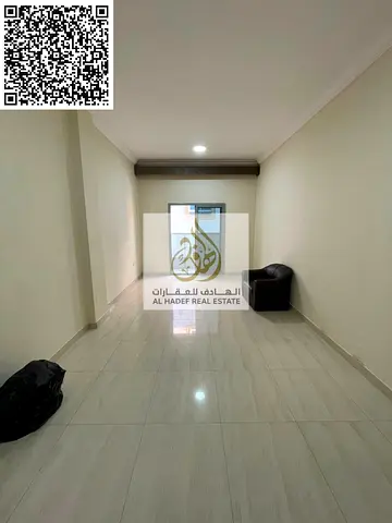 Two bedrooms, a living room, two bathrooms, and a balcony in Rawda 2, directly on Sheikh Ammar Stre