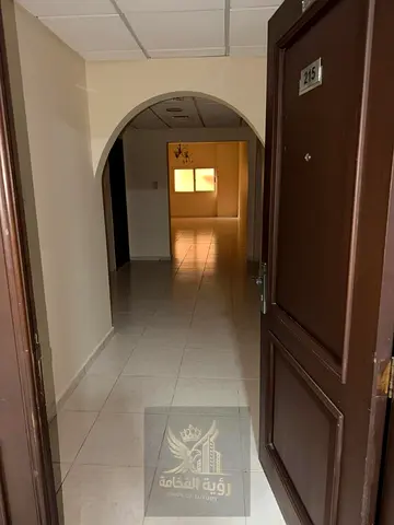 Two bedrooms and a living room in Al Majaz 3. Spacious area, prime location close to all services and transportation, with a maid's room. Near Nesto,