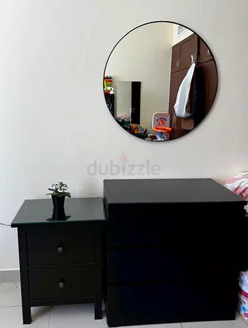 Black wooden chest of drawers and matching bedside table + mirror- good condition