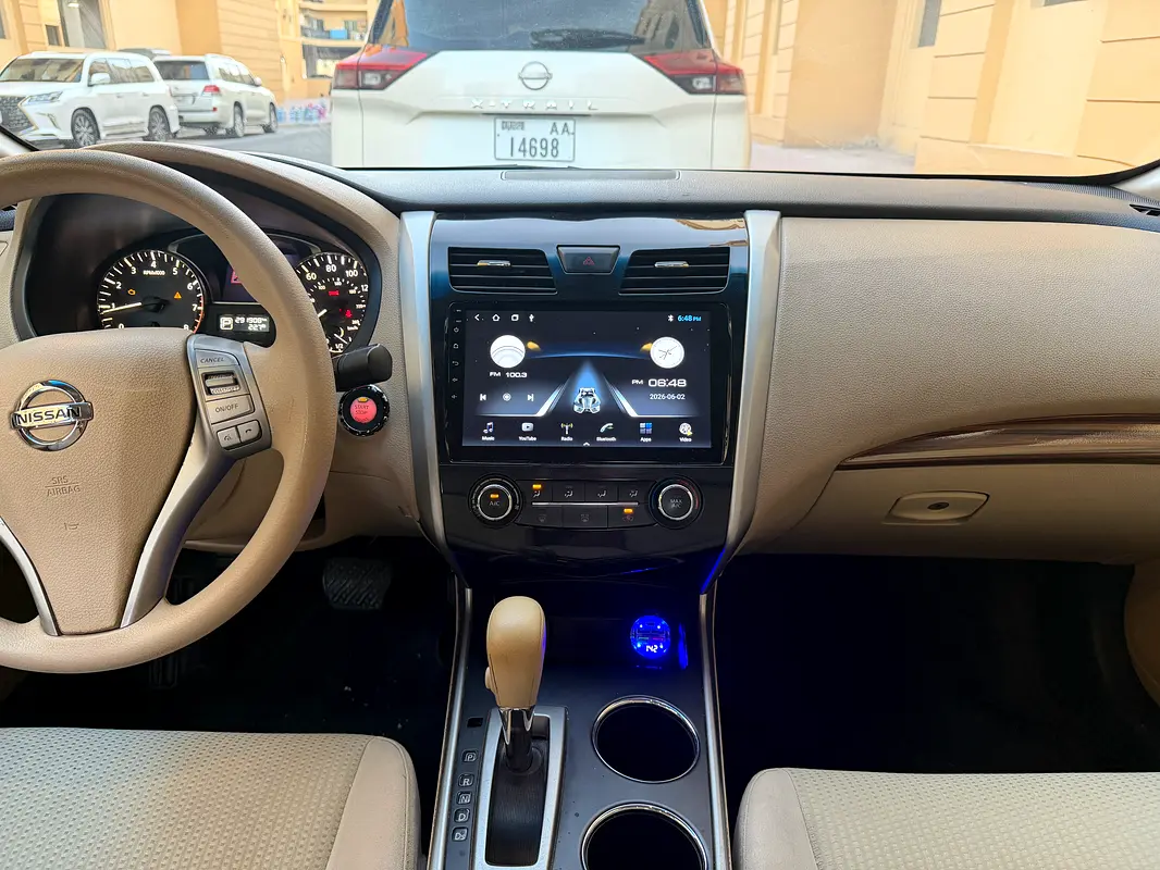 Nissan Altima 2015 — photo 1 of 4