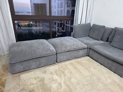 Light Grey L-Shaped Sectional Sofa with Ottoman - Good Condition