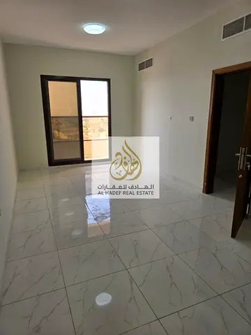 Annual rent in Ajman, Al Rawda 1 area, behind Al Hamidiya Police Station. The building is for families. It has a bedroom, living room, 2 bathrooms, ba